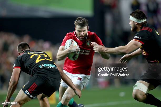 Jared Payne of the Lions is tackled during the match between the Chiefs and the British & Irish Lions at Waikato Stadium on June 20, 2017 in...