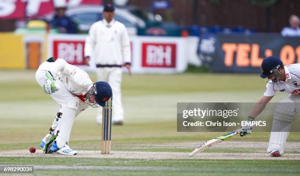 Lancashire wicket keeper Jos Buttler fumbles and saves Sussex's Craig Cachopa from being stumped during the LV County Championship match at the...