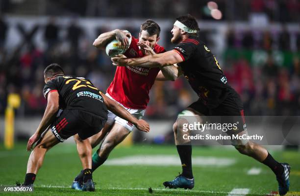 Hamilton , New Zealand - 20 June 2017; Jared Payne of the British & Irish Lions in action against Chase Tiatia, left, and Mitchell Brown of the...