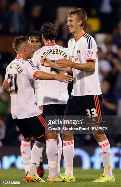 Fulham's Dan Burn celebrates scoring the second goal of the match