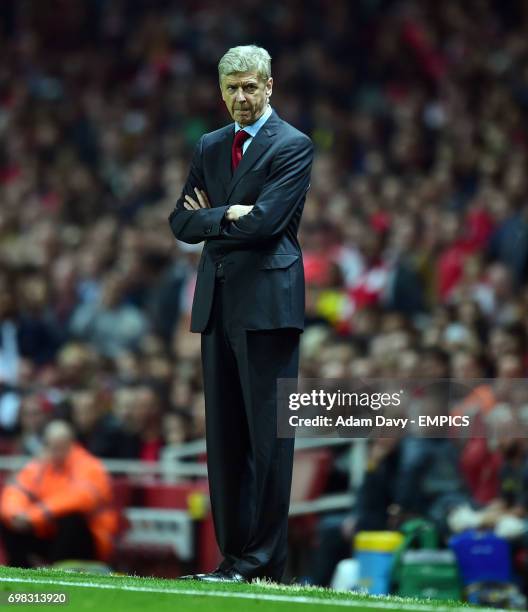 Arsenal's Arsene Wenger looks on during the game