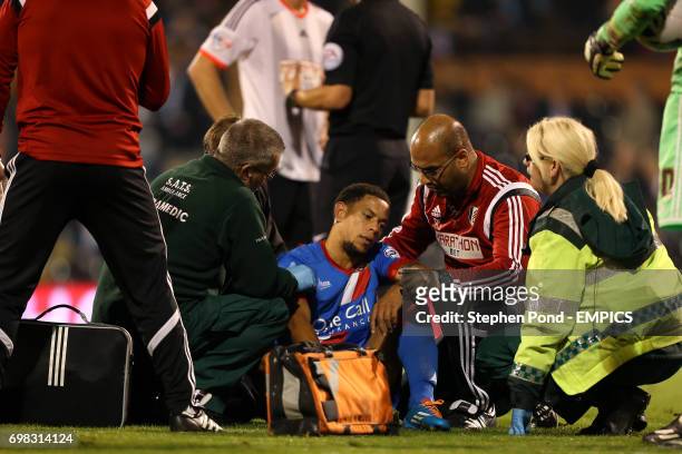 Doncaster Rovers' Nathan Tyson receives medical attention on the pitch