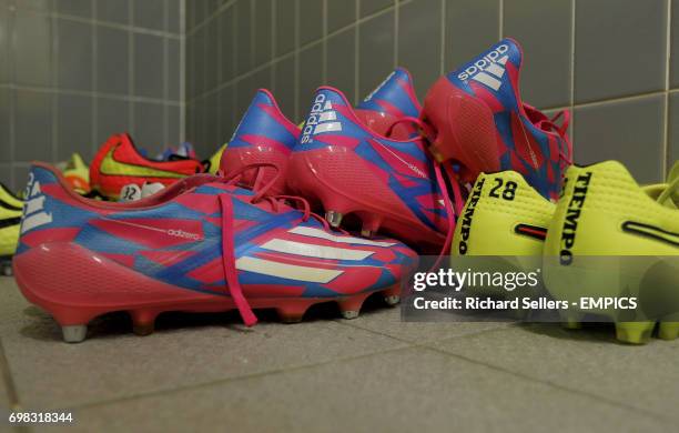 View of Reading player's boots in the away dressing room at the iPro Stadium.
