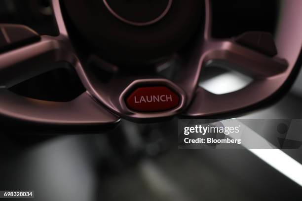 Launch' button sits on the steering column of an AeroMobil flying car on display at the 52nd International Paris Air Show at Le Bourget, in Paris,...