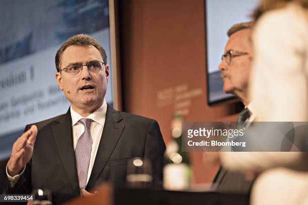 Thomas Jordan, president of the Swiss National Bank , gestures as he speaks during the Swiss International Finance Forum in Bern, Switzerland, on...