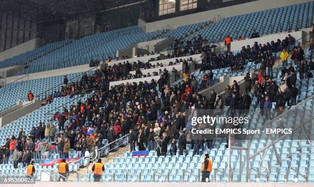 Spectators watch the game from the stands in the Arena Khimki