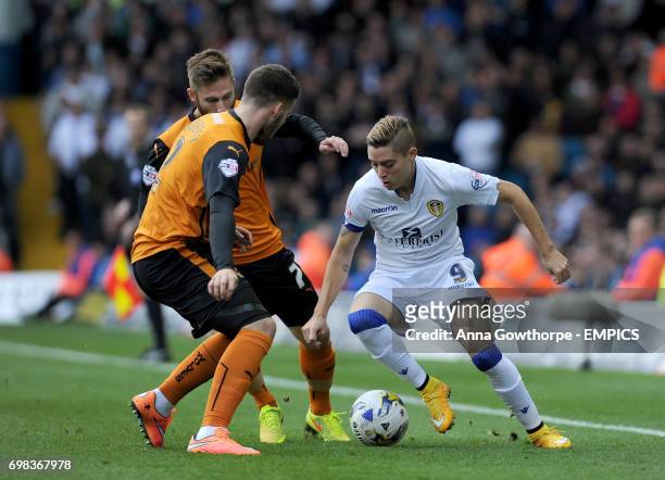 Leeds United's Adryan takes on Wolverhampton Wanderers' Matt Doherty and James Henry