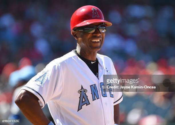 First base coach Alfredo Griffin of the Los Angeles Angels during the game against the Kansas City Royals at Angel Stadium of Anaheim on June 18,...