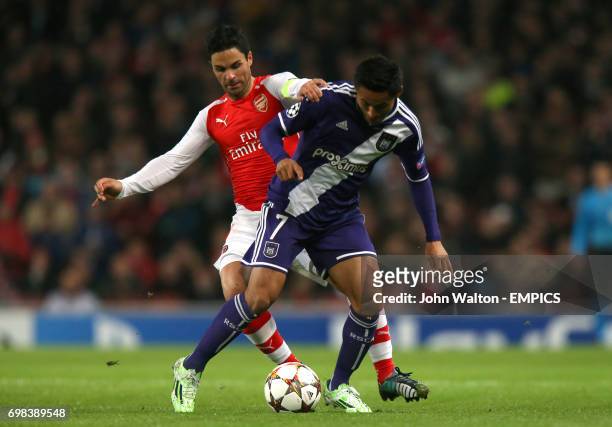 Arsenal's Mikel Arteta and RSC Anderlecht's Andy Najar battle for the ball
