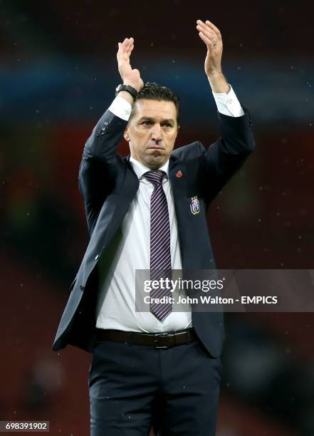 Anderlecht manager Besnik Hasi celebrates after his side come back from 0-3 to draw 3-3