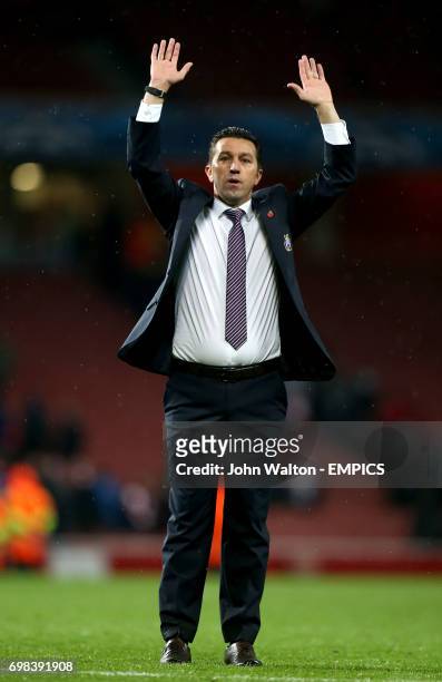 Anderlecht manager Besnik Hasi celebrates after his side come back from 0-3 to draw 3-3