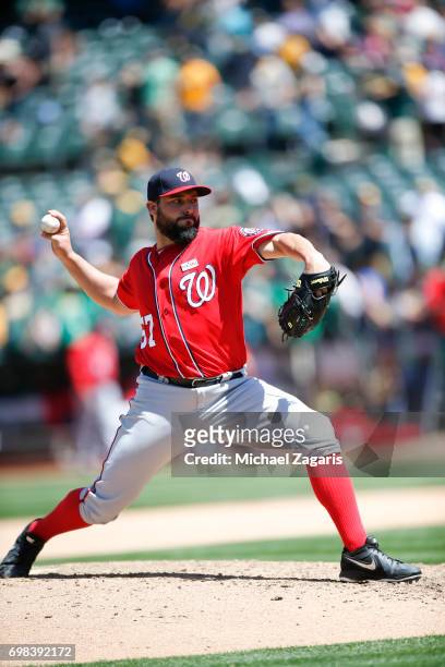 Tanner Roark of the Washington Nationals pitches during the game against the Athletics at the Oakland Alameda Coliseum on June 4, 2017 in Oakland,...