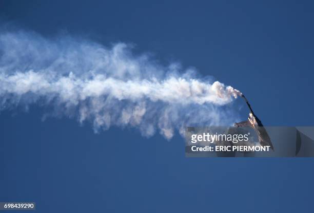 Dassault Aviation Rafale fighter aircraft performs its flying display during the International Paris Air Show in Le Bourget, north of Paris, on June...