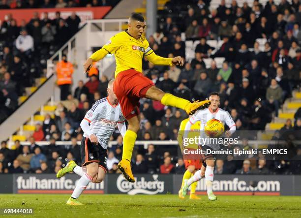 Watford's Troy Deeney scores his side's third goal during the Sky Bet Championship match at Craven Cottage, London.