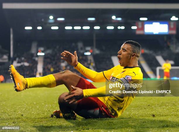 Watford's Troy Deeney celebrates scoring his side's third goal during the Sky Bet Championship match at Craven Cottage, London.