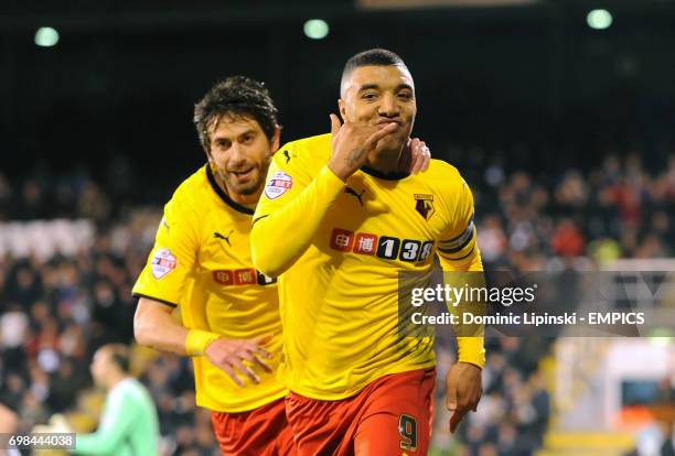 Watford's Troy Deeney celebrates scoring his side's second goal during the Sky Bet Championship match at Craven Cottage, London.