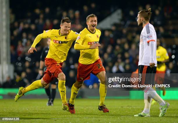 Watford's Almen Abdi celebrates scoring his side's fourth goal as Fulham's Konstantinos Stafylidis stands dejected during the Sky Bet Championship...
