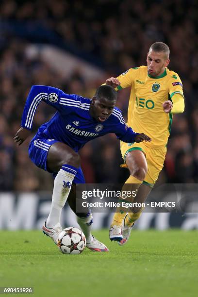 Chelsea's Kurt Zouma and Sporting Lisbon's Islam Slimani battle for the ball.