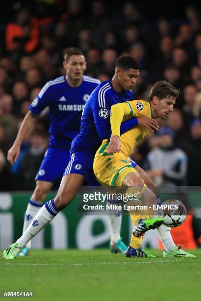 Chelsea's Ruben Loftus-Cheek and Sporting Lisbon's Adrien Silva battle for the ball.