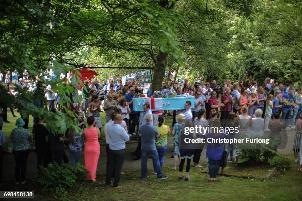 Mourners applaud as the coffin of Manchester attack victim Olivia Campbell-Hardy leaves The Parish Church of St Anne, in Tottington after her funeral...