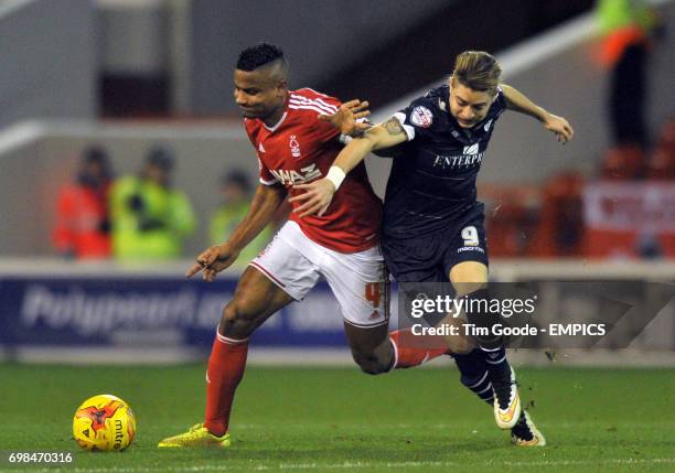 Nottingham Forest's Michael Mancienne and Leeds United's Adryan battle for the ball