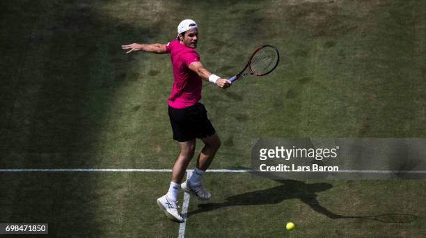 Tommy Haas of Germany plays a backhand during his match against Bernard Tomic of Australia during Day 4 of the Gerry Weber Open 2017 at on June 20,...