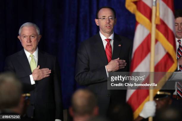 Attorney General Jeff Sessions and Deputy Attorney General Rod Rosenstein cite the Pledge of Allegiance during the National Summit on Crime Reduction...