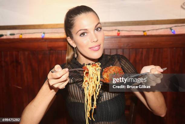 Miss Universe 2017 Iris Mittenaere visit Buca di Beppo Times Square on June 19, 2017 in New York City.