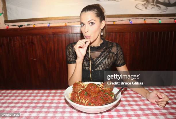 Miss Universe 2017 Iris Mittenaere visit Buca di Beppo Times Square on June 19, 2017 in New York City.