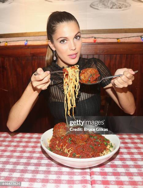 Miss Universe 2017 Iris Mittenaere visit Buca di Beppo Times Square on June 19, 2017 in New York City.