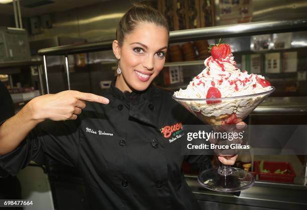 Miss Universe 2017 Iris Mittenaere visit Buca di Beppo Times Square on June 19, 2017 in New York City.