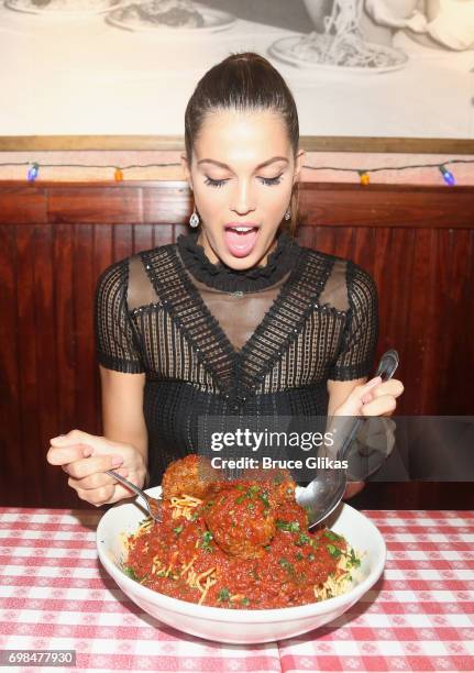 Miss Universe 2017 Iris Mittenaere visit Buca di Beppo Times Square on June 19, 2017 in New York City.