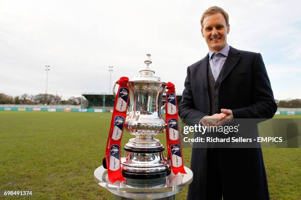 Dan Walker of the BBC with The FA cup on display at Blyth Spartans, Croft Park