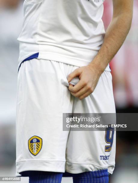 Leeds United's Adryan lines up for a free kick