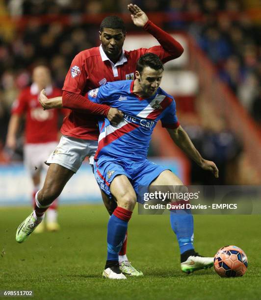 Bristol City's Mark Little and Doncaster Rovers' Enda Stevens battle for the ball