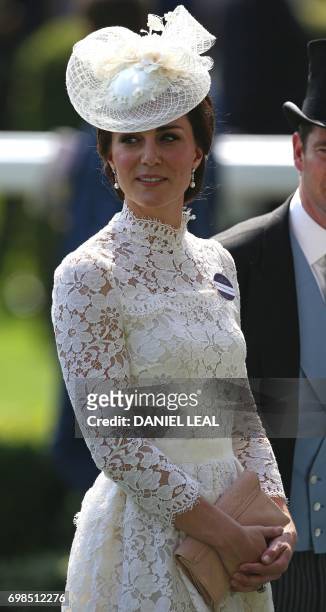 Britain's Catherine, Duchess of Cambridge attends day one of the Royal Ascot horse racing meet, in Ascot, west of London, on June 20, 2017. - The...