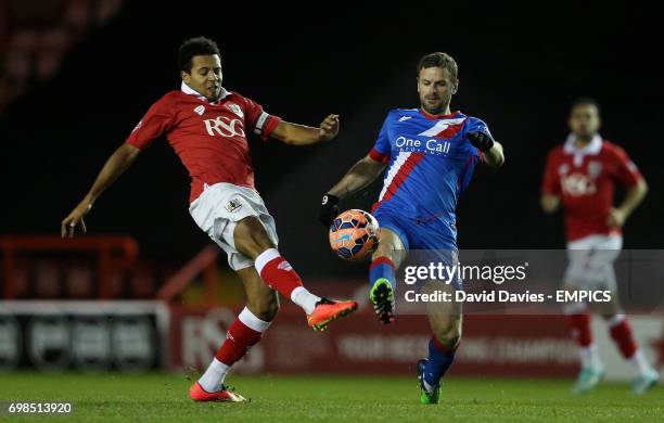 Bristol City's Korey Smith and Doncaster Rovers' Richie Wellens battle for the ball
