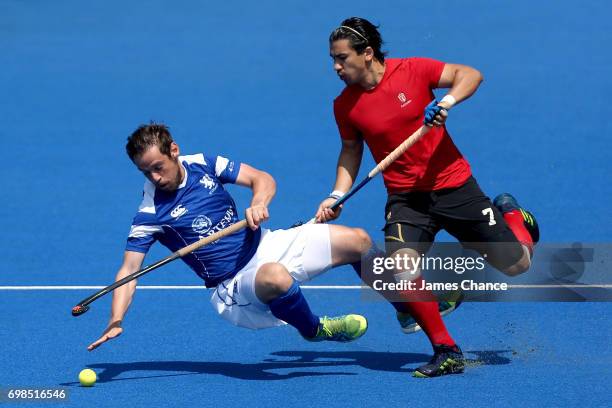 Alan Forsyth of Scotland and Gabriel Ho-Garcia of Canada battle for the ball during the Pool B match between Scotland and Canada on day six of the...