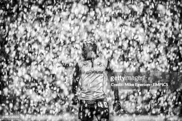 Wolverhampton Wanderers' Nouha Dicko stands in a heavy snow storm