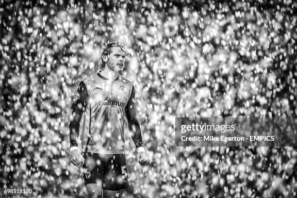 Wolverhampton Wanderers' Richard Stearman stands in a heavy snow storm