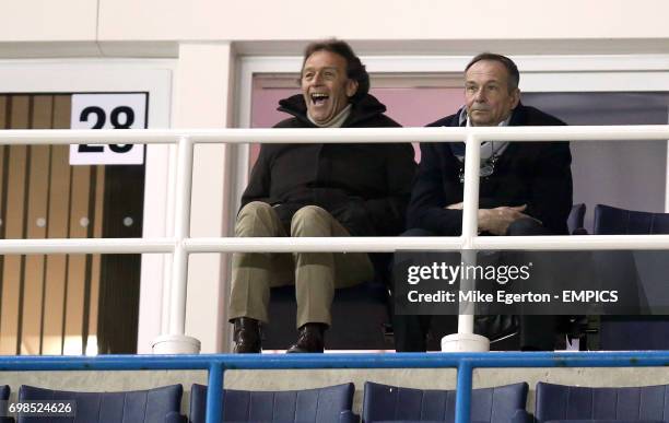 Leeds United 's banned owner Massimo Cellino watches the match from a private box