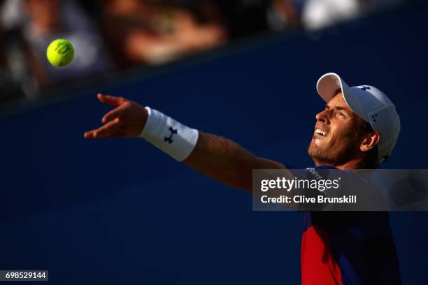 Andy Murray of Great Britain serves during the mens singles first round match against Jordan Thompson of Australia on day two of the 2017 Aegon...