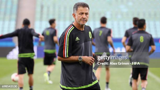 Head coach Juan Carlos Osorio looks on during a Mexico training session during the FIFA Confederations Cup Russia 2017 at Fisht Olympic Stadium on...