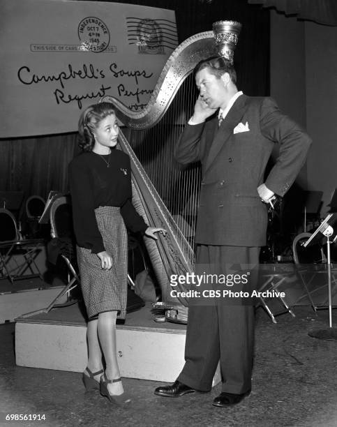 Radio program Request Performance sponsored by Campbell Soups. Stars perform in a variety of skits. Pictured from left is Jane Powell and Dennis...