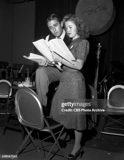 Pictured is Peter Lawford and Shirley Temple starring in The Camel Screen Guild Players adaptation of the theatrical film Adorable. Broadcast from...