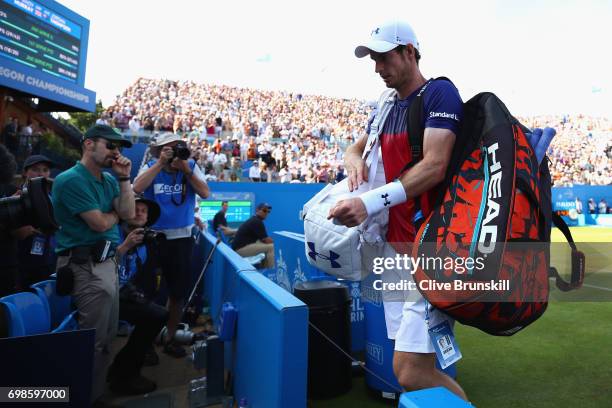 Andy Murray of Great Britain leaves the court following defeat in the mens singles first round match against Jordan Thompson of Australia on day two...