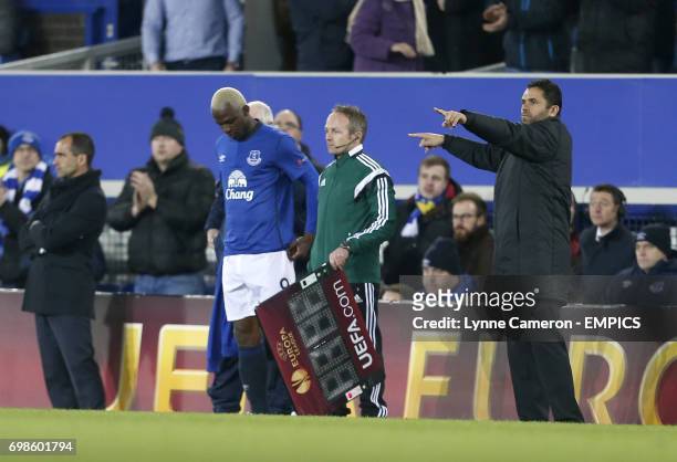 Everton's Arouna Kone waits to come on as a substitute