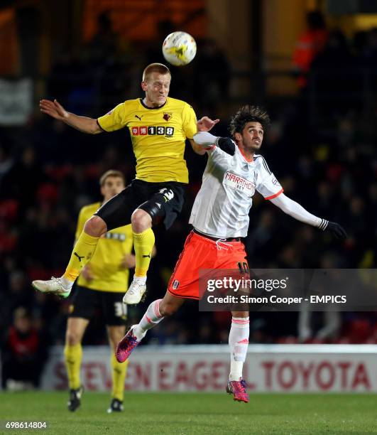Watford's Ben Watson and Fulham's Bryan Ruiz battle for the ball