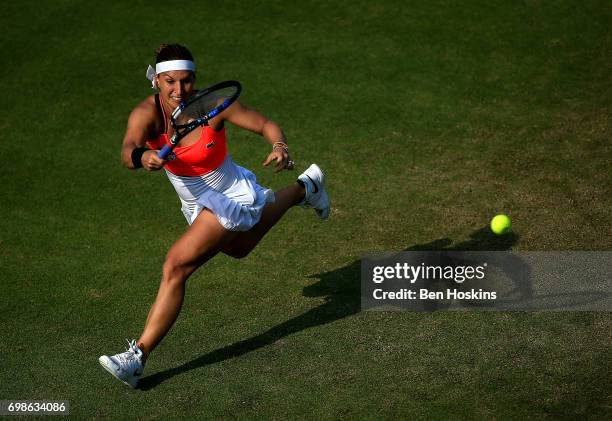 Dominika Cibulkova of Slovakia hits a forehand during her first round match against Lucia Safarova of The Czech Republic on day two of The Aegon...