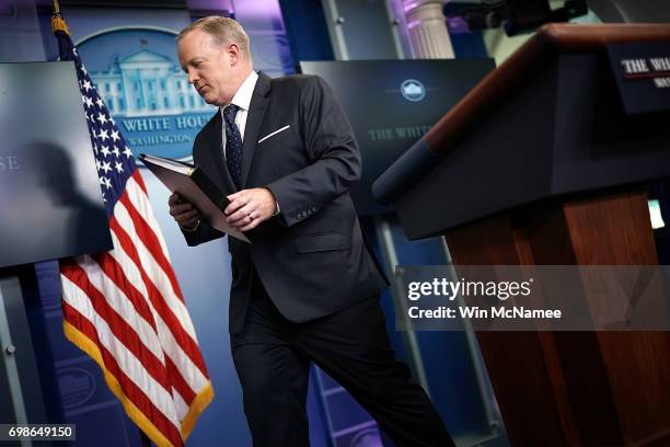 White House press secretary Sean Spicer departs after a briefing at the White House June 20, 2017 in Washington, DC. Spicer answered a range of...